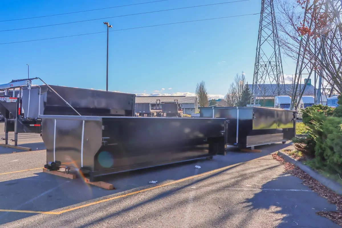 Roll-off dumpster ready for waste disposal at job site for Commercial Dumpster Rental in Cohasset
